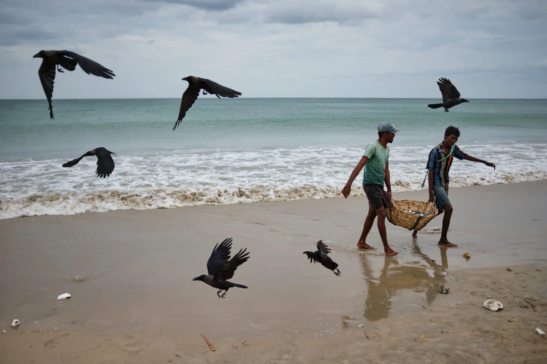 Fishermen with daily catch